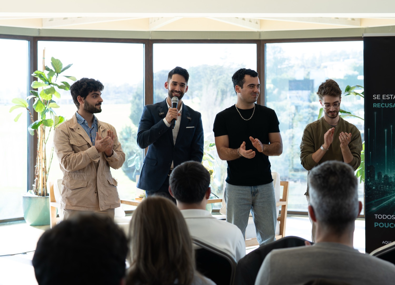 The PulsifyAI engineering team on stage